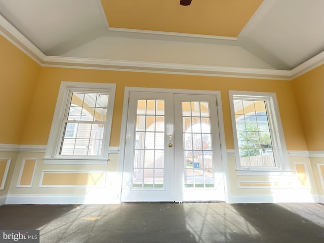 7212 Highland St, Springfield, VA 22150 - doorway featuring carpet floors, a wainscoted wall, french doors, a ceiling fan, and a decorative wall