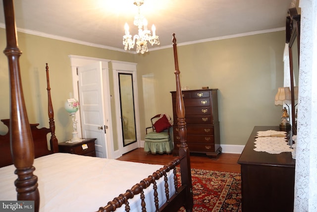 814 Morgan Ave, Palmyra, NJ 08065 - bedroom with dark wood-type flooring, ornamental molding, and a chandelier