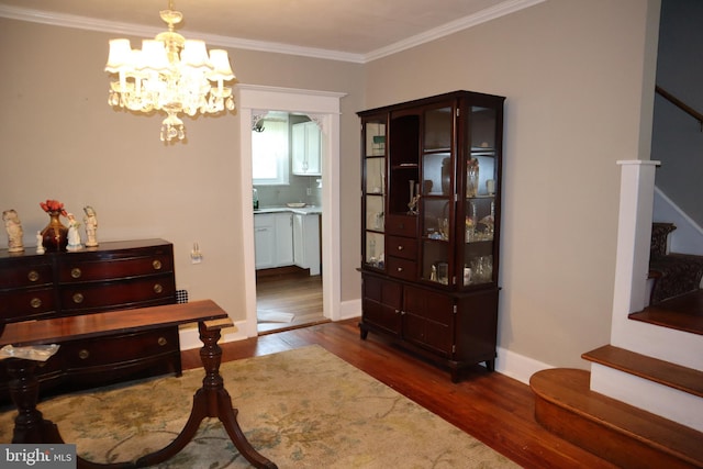 814 Morgan Ave, Palmyra, NJ 08065 - interior space featuring stairway, wood finished floors, crown molding, and a chandelier