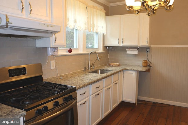814 Morgan Ave, Palmyra, NJ 08065 - kitchen with stainless steel gas stove, under cabinet range hood, a chandelier, ornamental molding, and white cabinets
