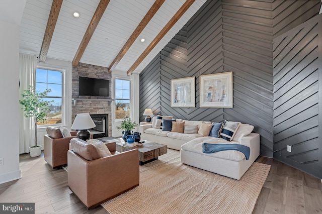 539 Whimsical Dr, Havre De Grace, MD 21078 - living room featuring a fireplace, hardwood / wood-style floors, high vaulted ceiling, wooden walls, and a wooden ceiling with exposed beams