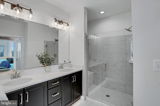 539 Whimsical Dr, Havre De Grace, MD 21078 - bathroom with double vanity, a marble finish shower, ensuite bath, marble finish flooring, and recessed lighting