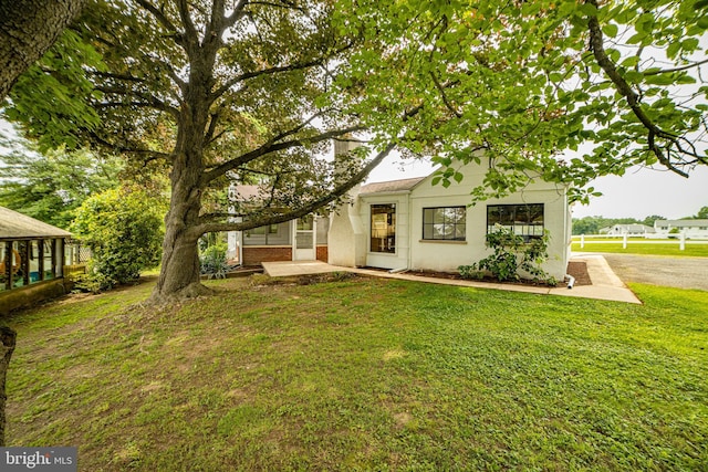 4117 Chichester Ave, Upper Chichester, PA 19061 - view of front facade with a front lawn