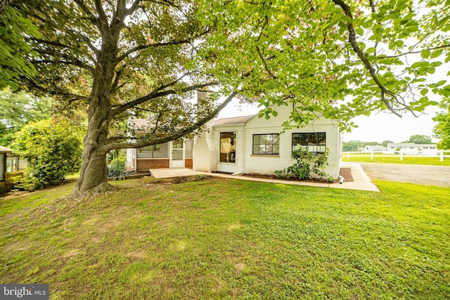 4117 Chichester Ave, Upper Chichester, PA 19061 - view of front of home with a front lawn and brick siding