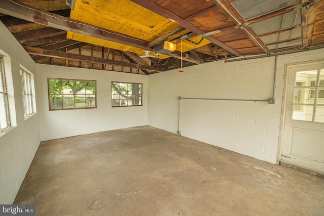 4117 Chichester Ave, Upper Chichester, PA 19061 - garage with a garage door opener and concrete block wall