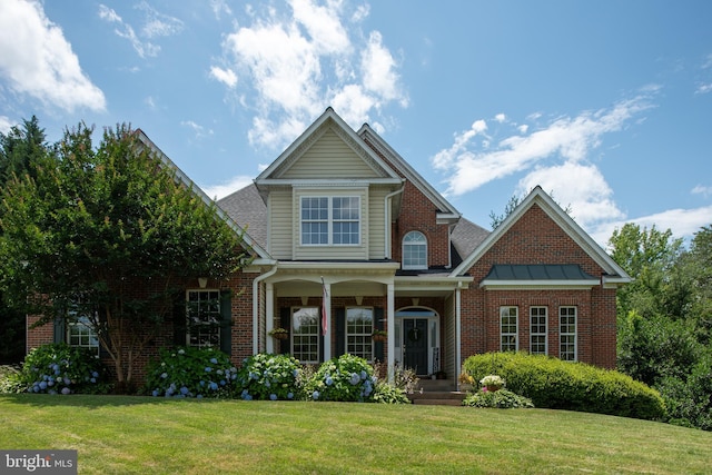 4 Monument Dr, Stafford, VA 22554 - traditional-style house with brick siding and a front yard