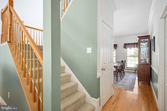 4 Monument Dr, Stafford, VA 22554 - stairway featuring crown molding and wood finished floors