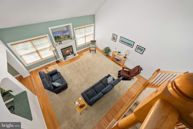 4 Monument Dr, Stafford, VA 22554 - living area featuring a fireplace with flush hearth and wood finished floors