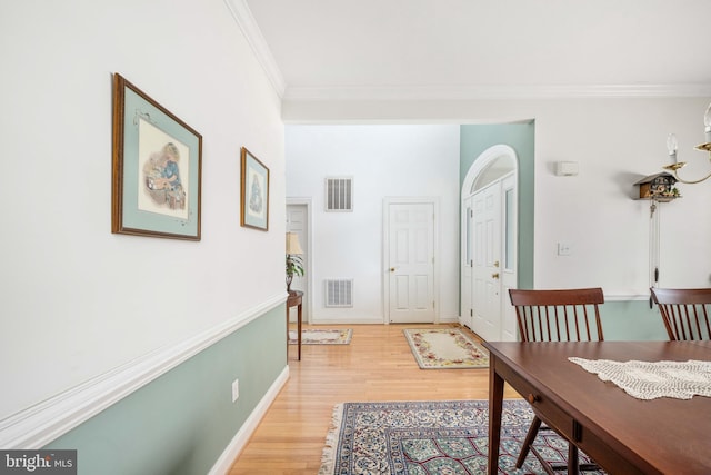 4 Monument Dr, Stafford, VA 22554 - entryway with crown molding and light wood-style flooring