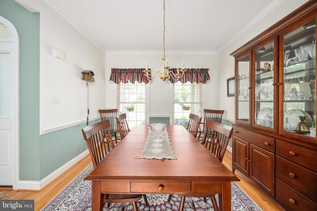 4 Monument Dr, Stafford, VA 22554 - dining room with light wood finished floors, crown molding, and a chandelier