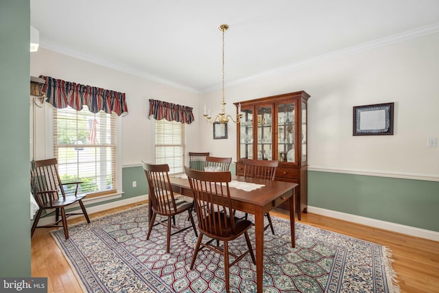 4 Monument Dr, Stafford, VA 22554 - dining area with a chandelier, crown molding, and light wood finished floors