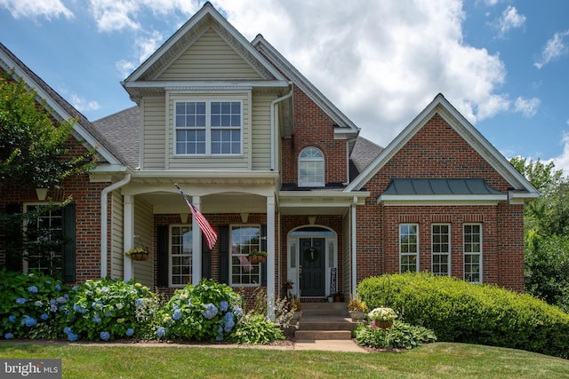 4 Monument Dr, Stafford, VA 22554 - view of front of property featuring brick siding and roof with shingles