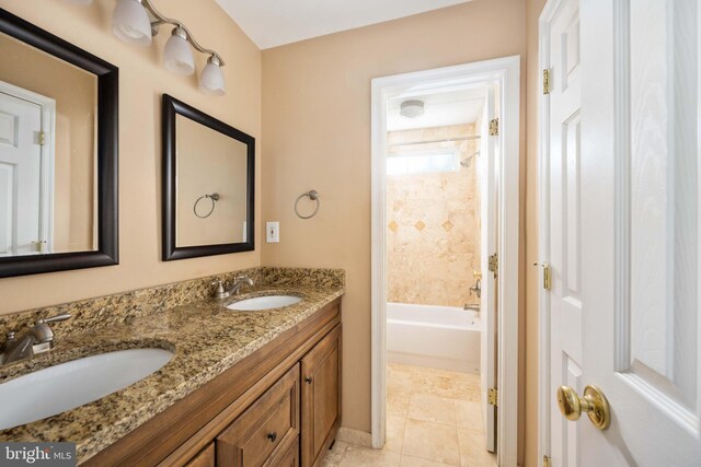 4 Monument Dr, Stafford, VA 22554 - bathroom featuring double vanity and bathing tub / shower combination