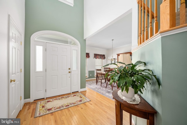 4 Monument Dr, Stafford, VA 22554 - entryway with hardwood / wood-style flooring and a towering ceiling