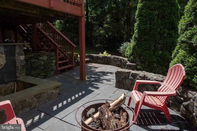4 Monument Dr, Stafford, VA 22554 - view of patio / terrace with stairs and a fire pit