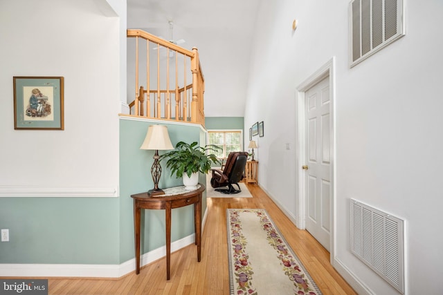 4 Monument Dr, Stafford, VA 22554 - corridor with a towering ceiling and wood finished floors
