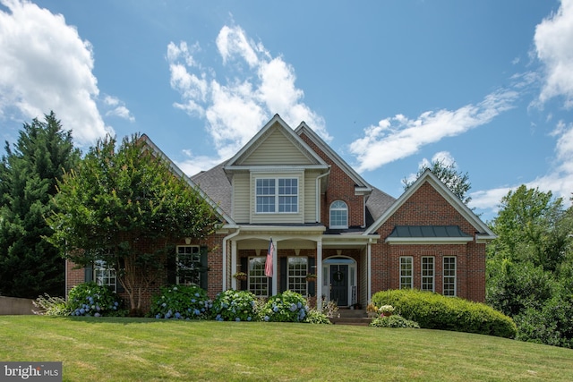 4 Monument Dr, Stafford, VA 22554 - view of front of property with brick siding and a front yard