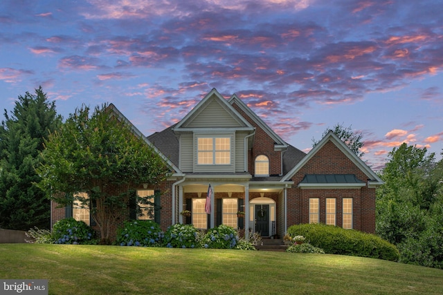 4 Monument Dr, Stafford, VA 22554 - traditional-style house with brick siding and a front yard