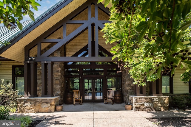 4 Monument Dr, Stafford, VA 22554 - property entrance with french doors and stone siding
