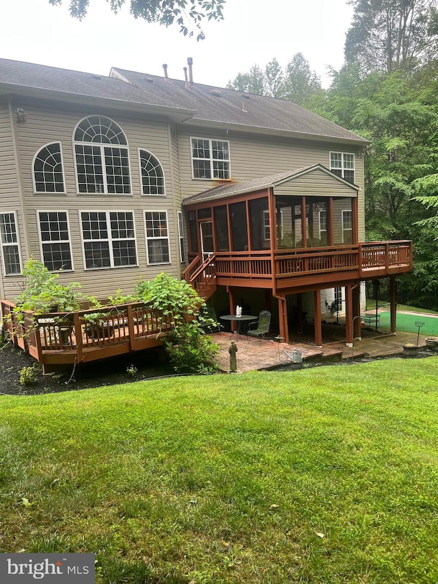 6194 Treywood Ln, Manassas, VA 20112 - back of house featuring a sunroom, a patio, a deck, a lawn, and stairway