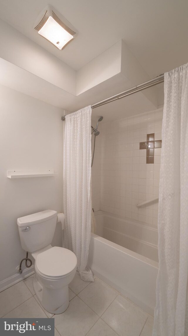 3418 Summit Ct NE Unit 3418, Washington, DC 20018 - bathroom featuring tile patterned floors and shower / bath combo with shower curtain