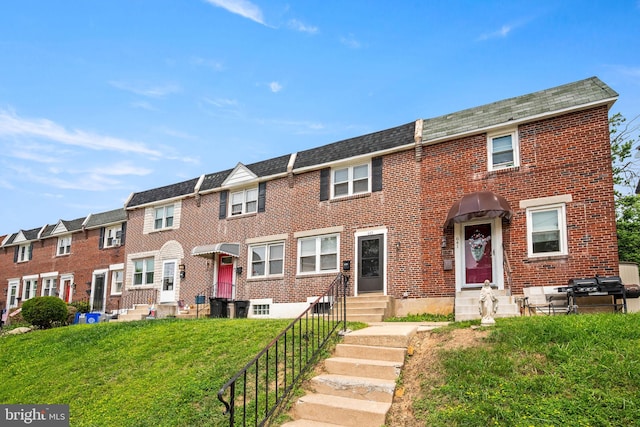 643 Beech Ave, Glenolden, PA 19036 - multi unit property with entry steps, brick siding, and a front yard