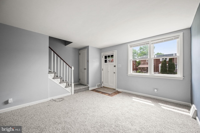 643 Beech Ave, Glenolden, PA 19036 - carpeted foyer featuring stairs and baseboards