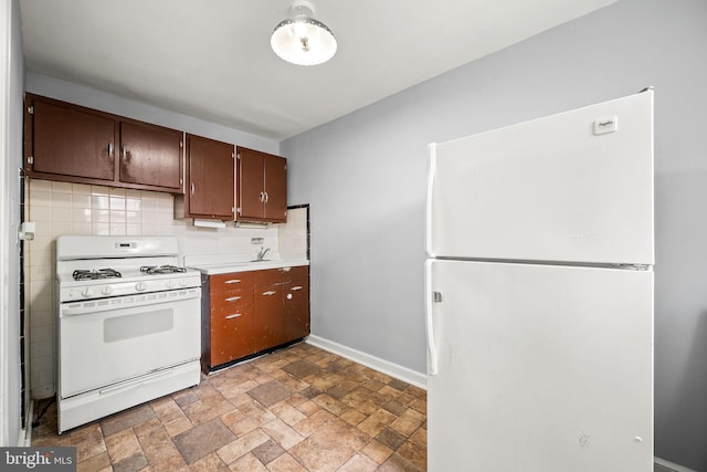 643 Beech Ave, Glenolden, PA 19036 - kitchen featuring white appliances, light stone finish flooring, light countertops, tasteful backsplash, and dark brown cabinets