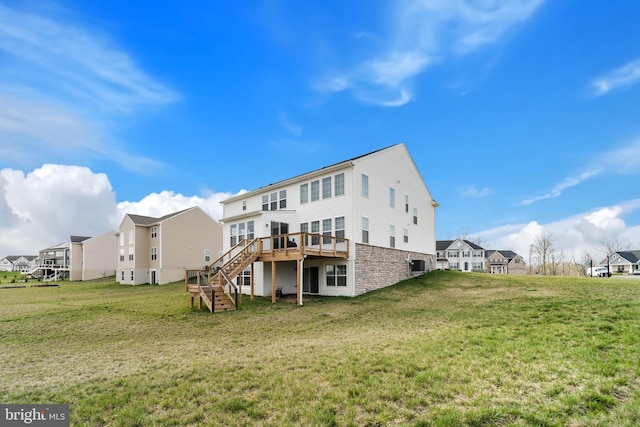 10137 Premier St, Fredericksburg, VA 22408 - back of property with stairway, a deck, stone siding, and a lawn
