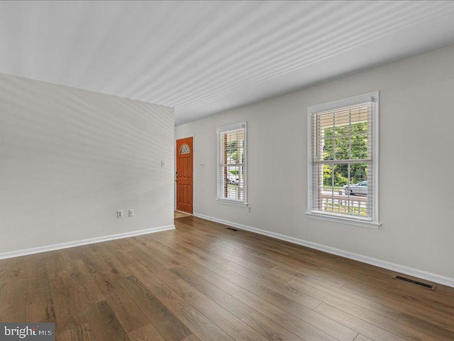 900 Young Dairy Ct, Herndon, VA 20170 - empty room featuring baseboards and wood finished floors