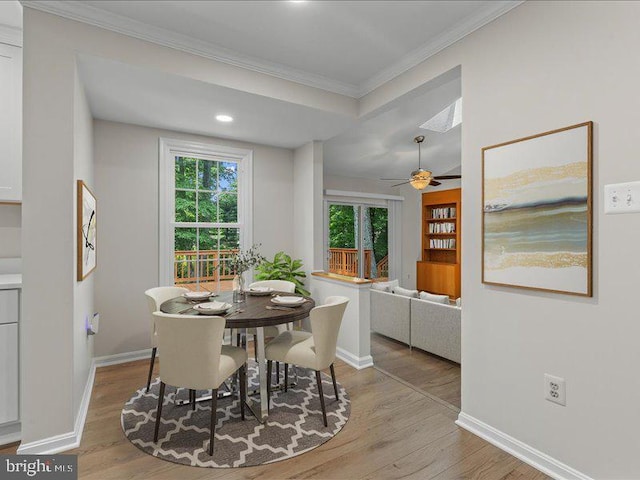 900 Young Dairy Ct, Herndon, VA 20170 - dining room with wood finished floors, crown molding, a ceiling fan, and recessed lighting