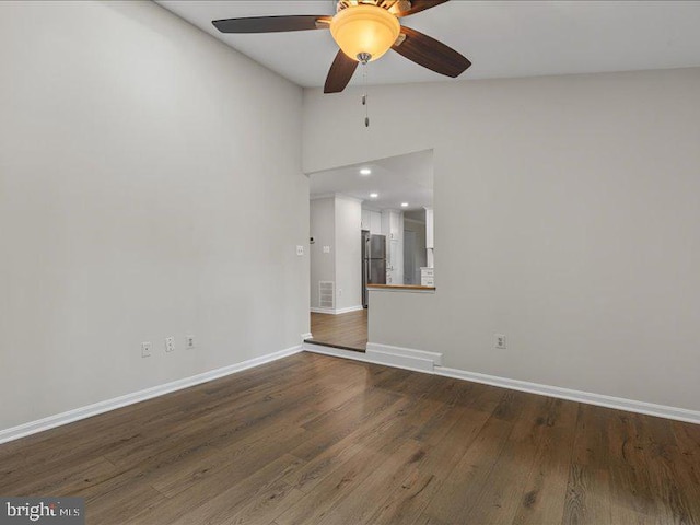 900 Young Dairy Ct, Herndon, VA 20170 - unfurnished room with ceiling fan, dark wood finished floors, recessed lighting, and vaulted ceiling