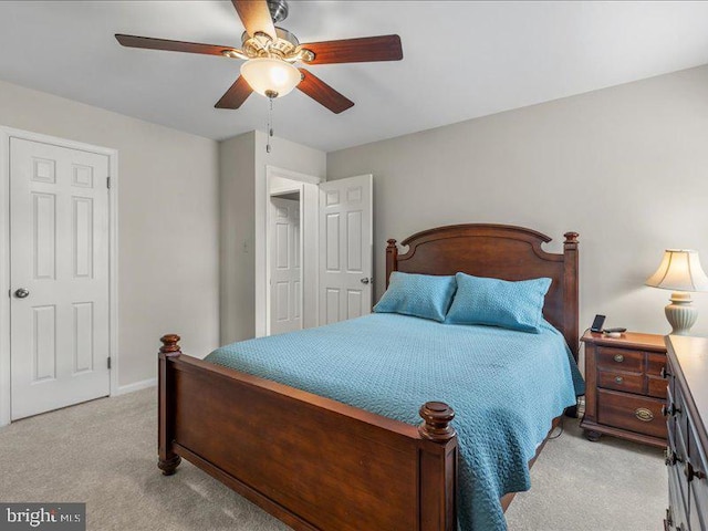 900 Young Dairy Ct, Herndon, VA 20170 - bedroom with light colored carpet and a ceiling fan