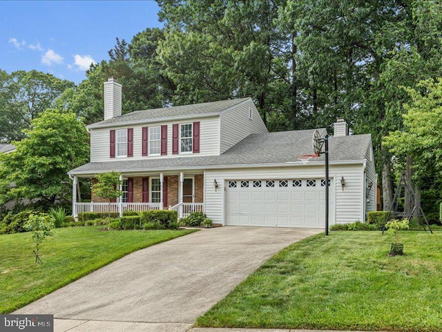 900 Young Dairy Ct, Herndon, VA 20170 - traditional-style home with a porch, concrete driveway, an attached garage, a chimney, and a front lawn