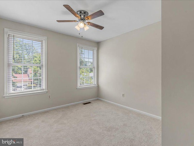 900 Young Dairy Ct, Herndon, VA 20170 - carpeted spare room with baseboards and a ceiling fan