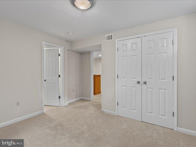 900 Young Dairy Ct, Herndon, VA 20170 - unfurnished bedroom featuring light carpet and a closet