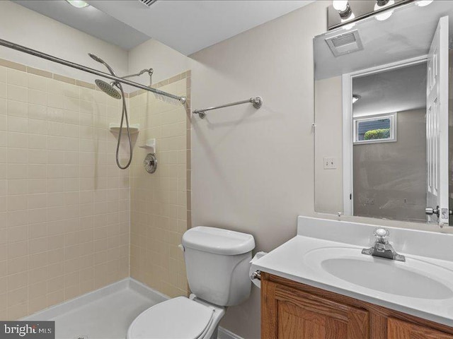 900 Young Dairy Ct, Herndon, VA 20170 - bathroom featuring vanity and a tile shower