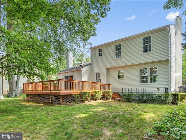 900 Young Dairy Ct, Herndon, VA 20170 - rear view of house featuring a chimney, a lawn, and a deck