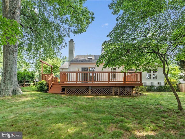 900 Young Dairy Ct, Herndon, VA 20170 - rear view of property with a deck and a chimney