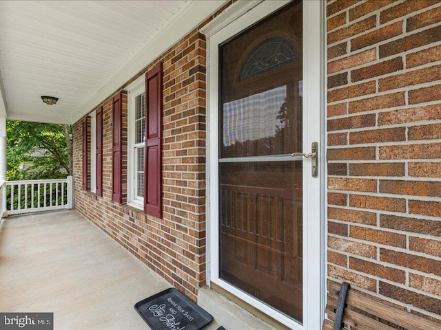 900 Young Dairy Ct, Herndon, VA 20170 - entrance to property with a porch and brick siding