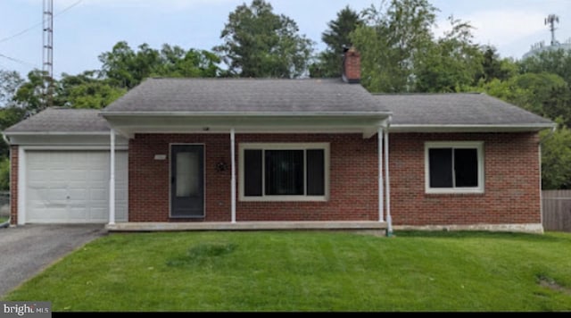 1116 2nd Ave, Brunswick, MD 21716 - ranch-style home with a garage, brick siding, a chimney, and asphalt driveway