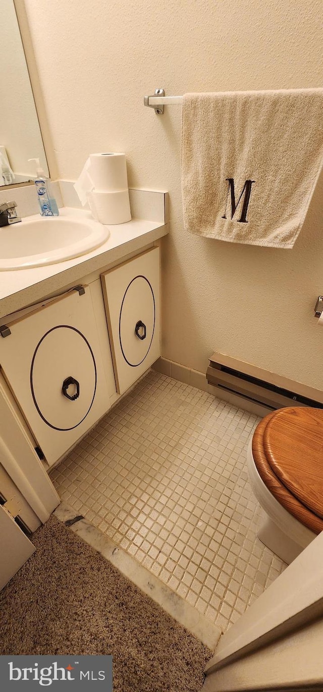 540 Berberis Plz, Monroe Township, NJ 08831 - bathroom with baseboard heating and vanity