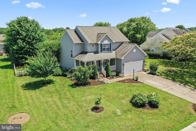 135 Hobbs Hole Ln, Tappahannock, VA 22560 - traditional-style house featuring covered porch, a garage, driveway, and a front lawn