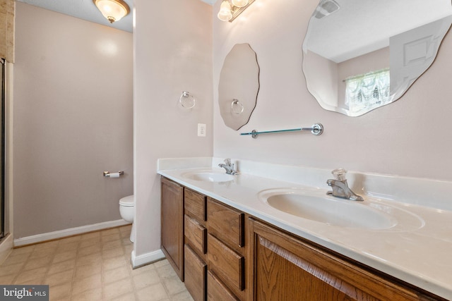 135 Hobbs Hole Ln, Tappahannock, VA 22560 - full bathroom with double vanity, tile patterned floors, and a shower with door