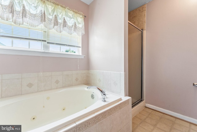 135 Hobbs Hole Ln, Tappahannock, VA 22560 - bathroom featuring a tub with jets and a shower stall
