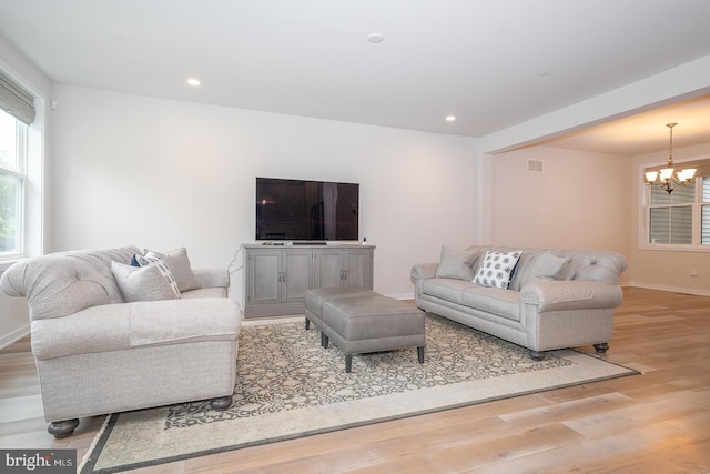 726 Switchman Rd, Media, PA 19063 - living room with a chandelier, wood finished floors, healthy amount of natural light, and recessed lighting