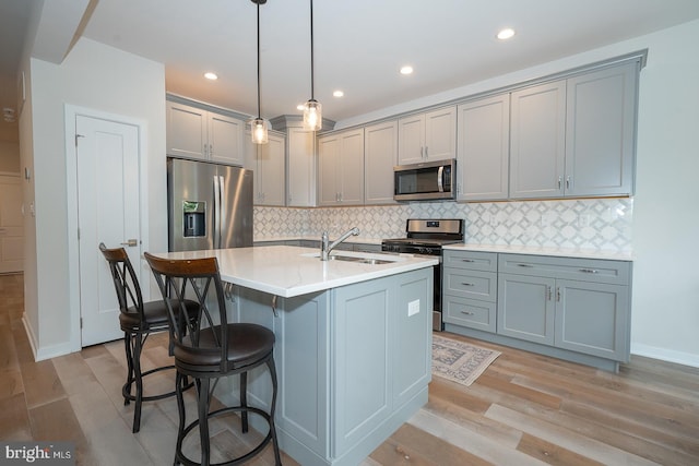 726 Switchman Rd, Media, PA 19063 - kitchen featuring appliances with stainless steel finishes, gray cabinets, light wood-type flooring, and recessed lighting