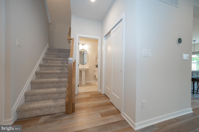 726 Switchman Rd, Media, PA 19063 - staircase featuring wood finished floors and baseboards