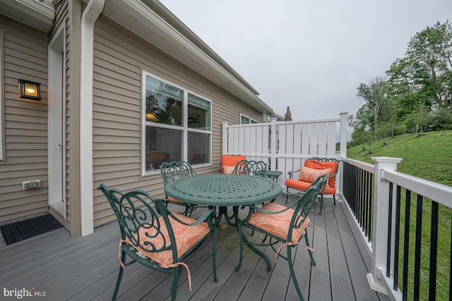 726 Switchman Rd, Media, PA 19063 - wooden deck with outdoor dining area and a lawn