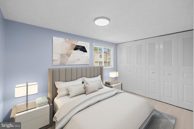 8318 Brookvale Ct, Springfield, VA 22153 - bedroom featuring a textured ceiling, carpet flooring, and a closet